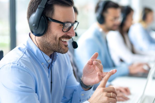 Professional,Customer,Support,Agent,Man,Counting,On,Fingers,While,Assisting